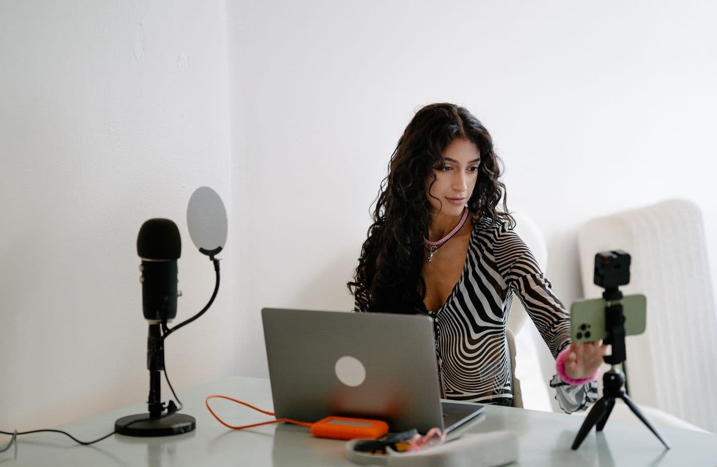 A seller at her desk with a laptop after a live show